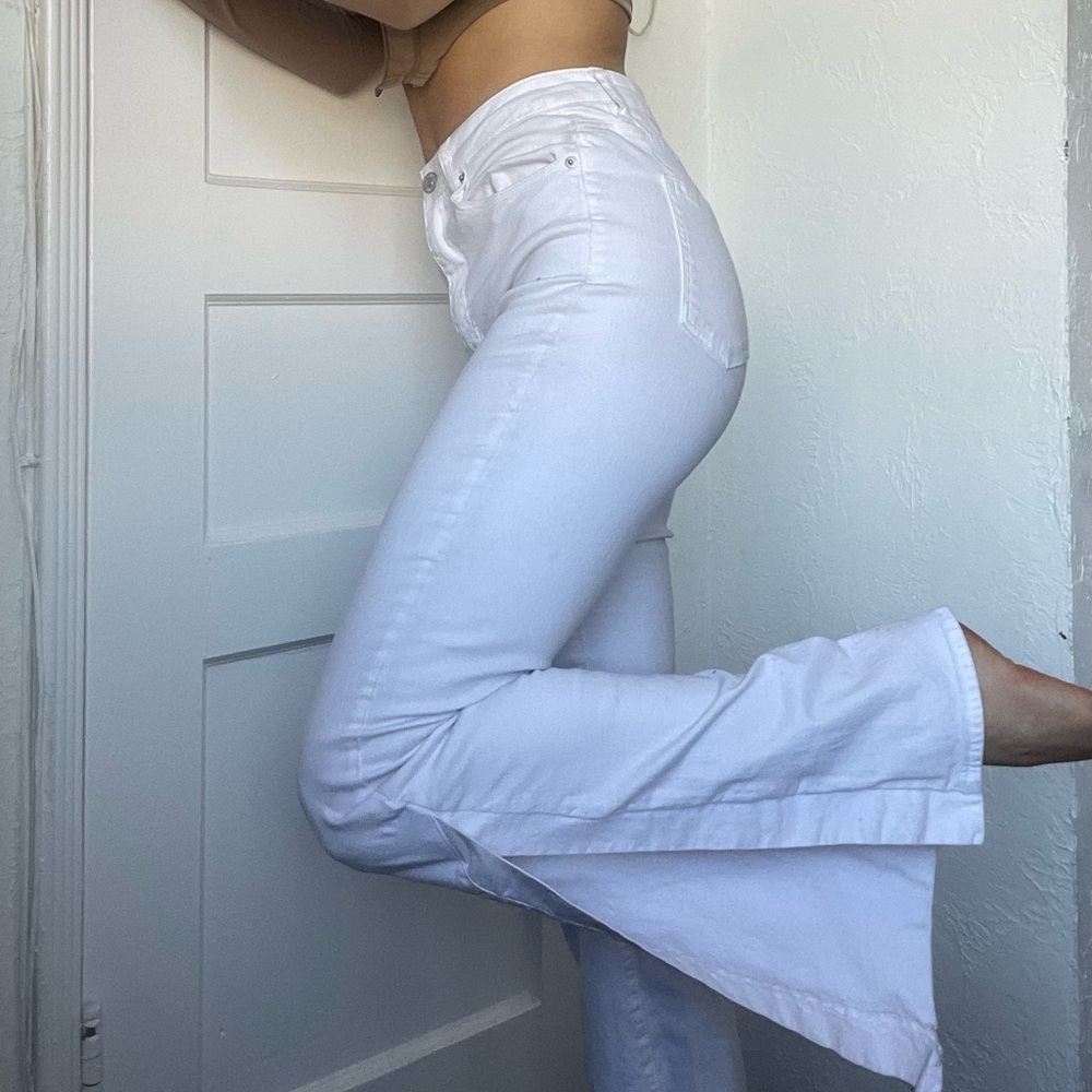White flared pants